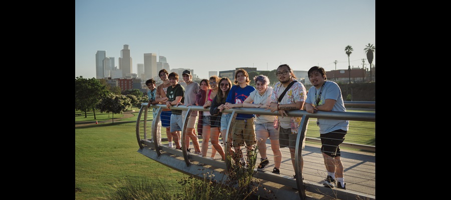 DiLA Students posing together on a boardwalk SU2023